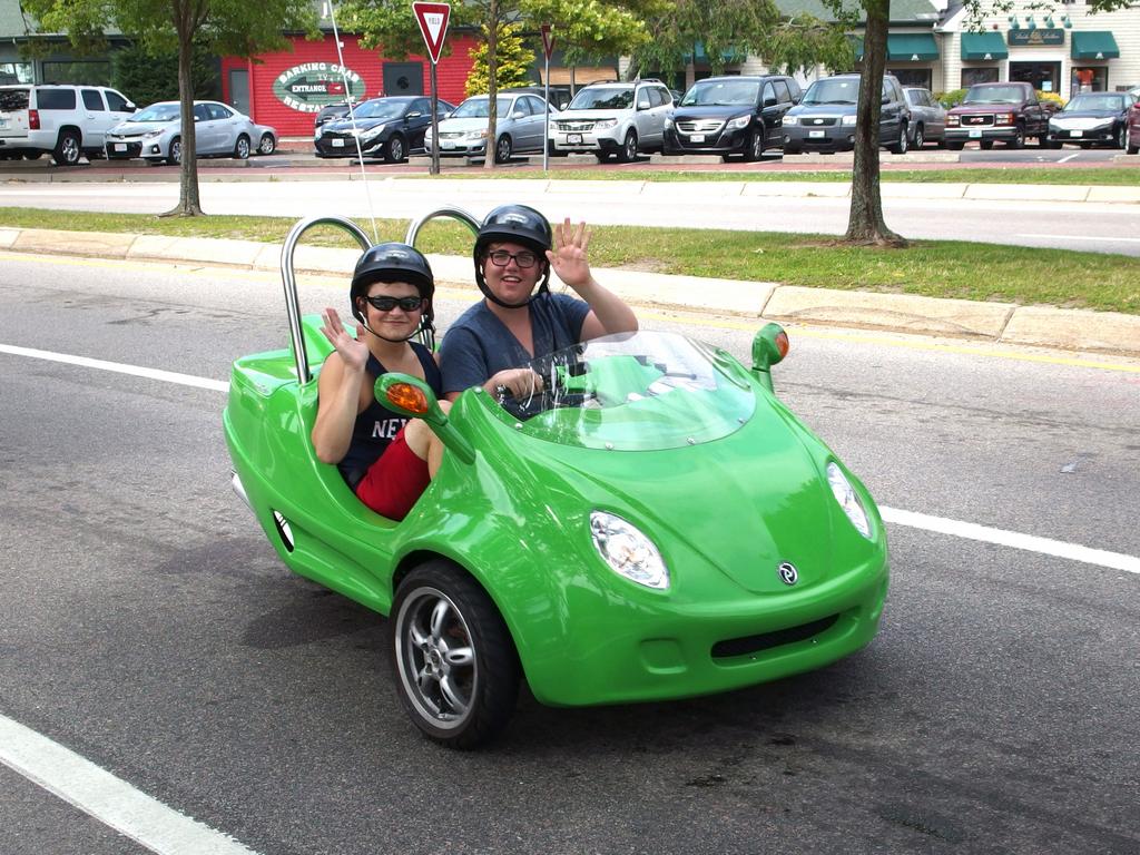 motorized tricycle as optional tourist transportation for getting around the streets of Newport in Rhode Island