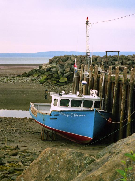 grounded boat at low tide in Nova Scotia in June 1998