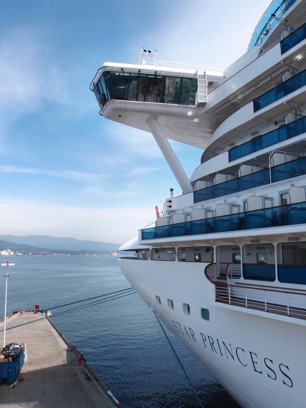 a huge cruise ship at dock in Vancouver at British Columbia in Canada