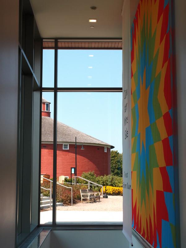 view of the Round Barn from inside the Center for Art and Education at the Shelburne Museum in Vermont