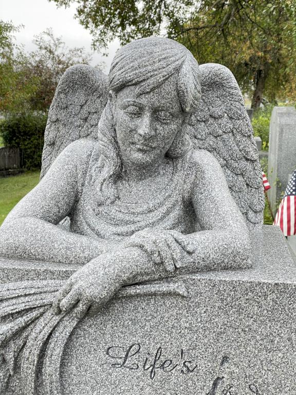 gravestone decoration in October at Hope Cemetery in Barre, Vermont