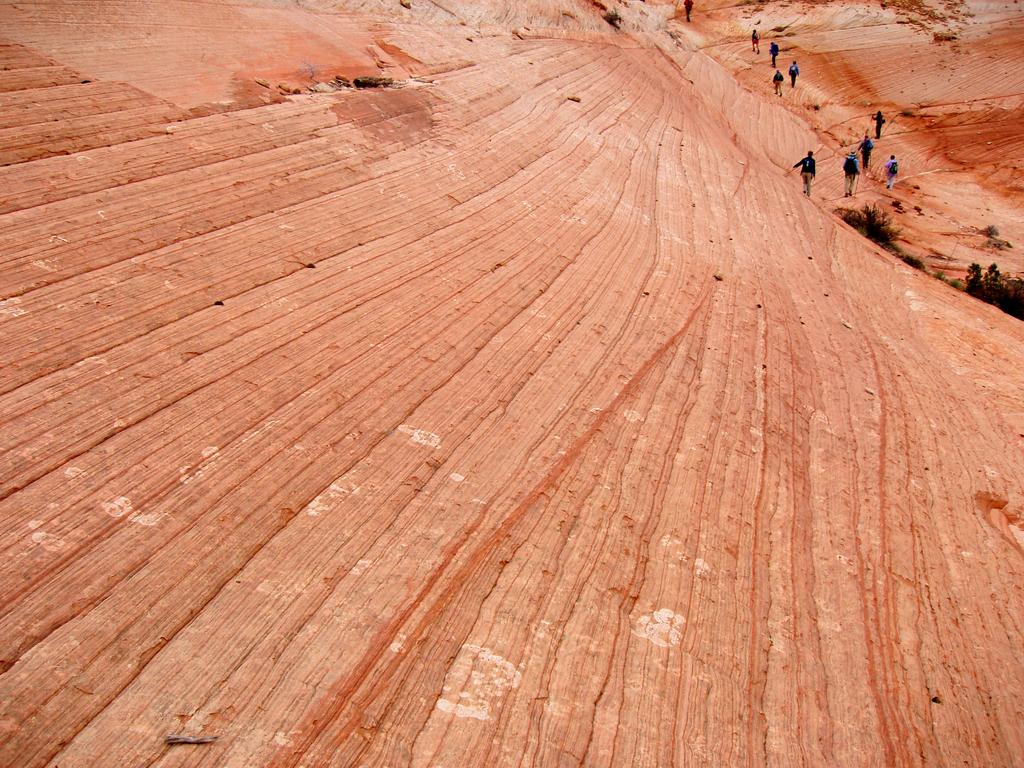 hikers in a backcountry slickrock canyon at Zion National Park in Utah