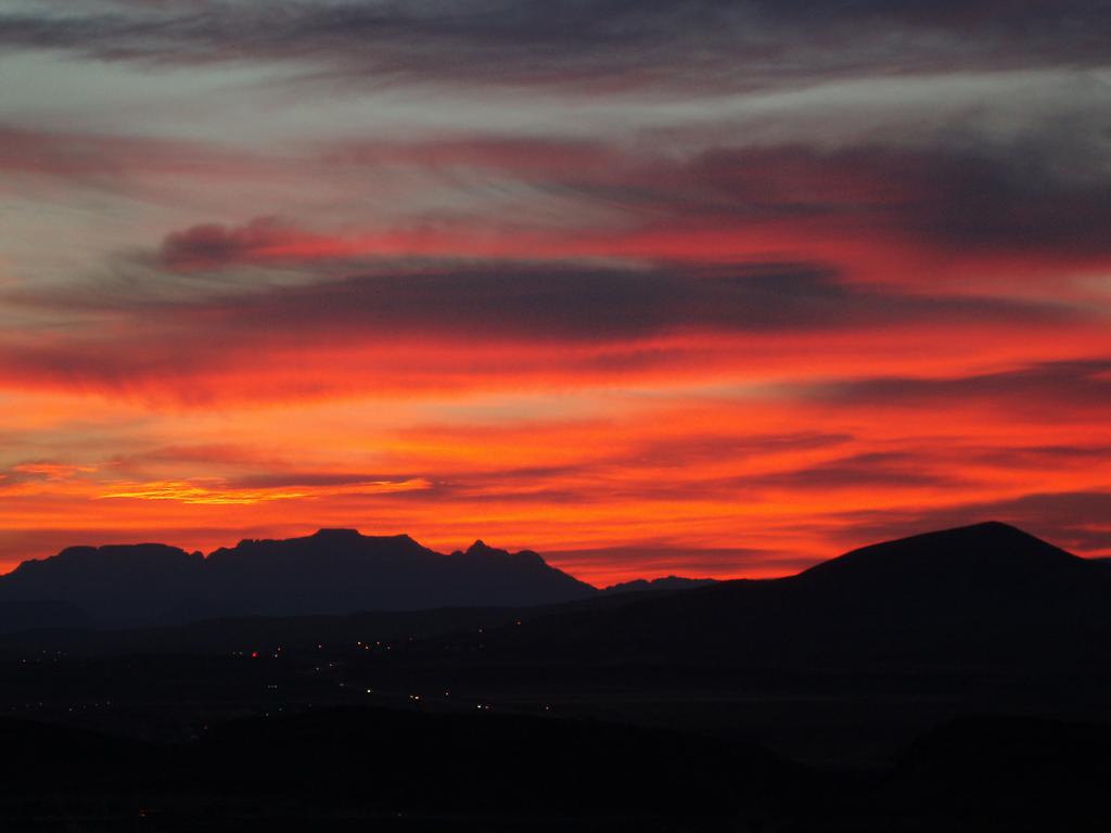 ominous sunrise on the drive into Zion National Park in Utah